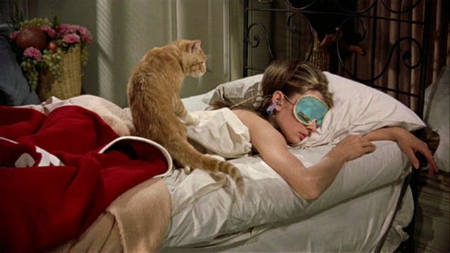 audrey-hepburn-as-holy-golightly-sleeping-breakfast-at-tiffanys
