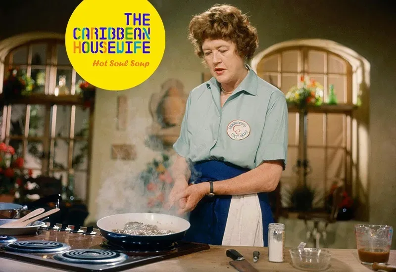 A woman is preparing food in a kitchen.