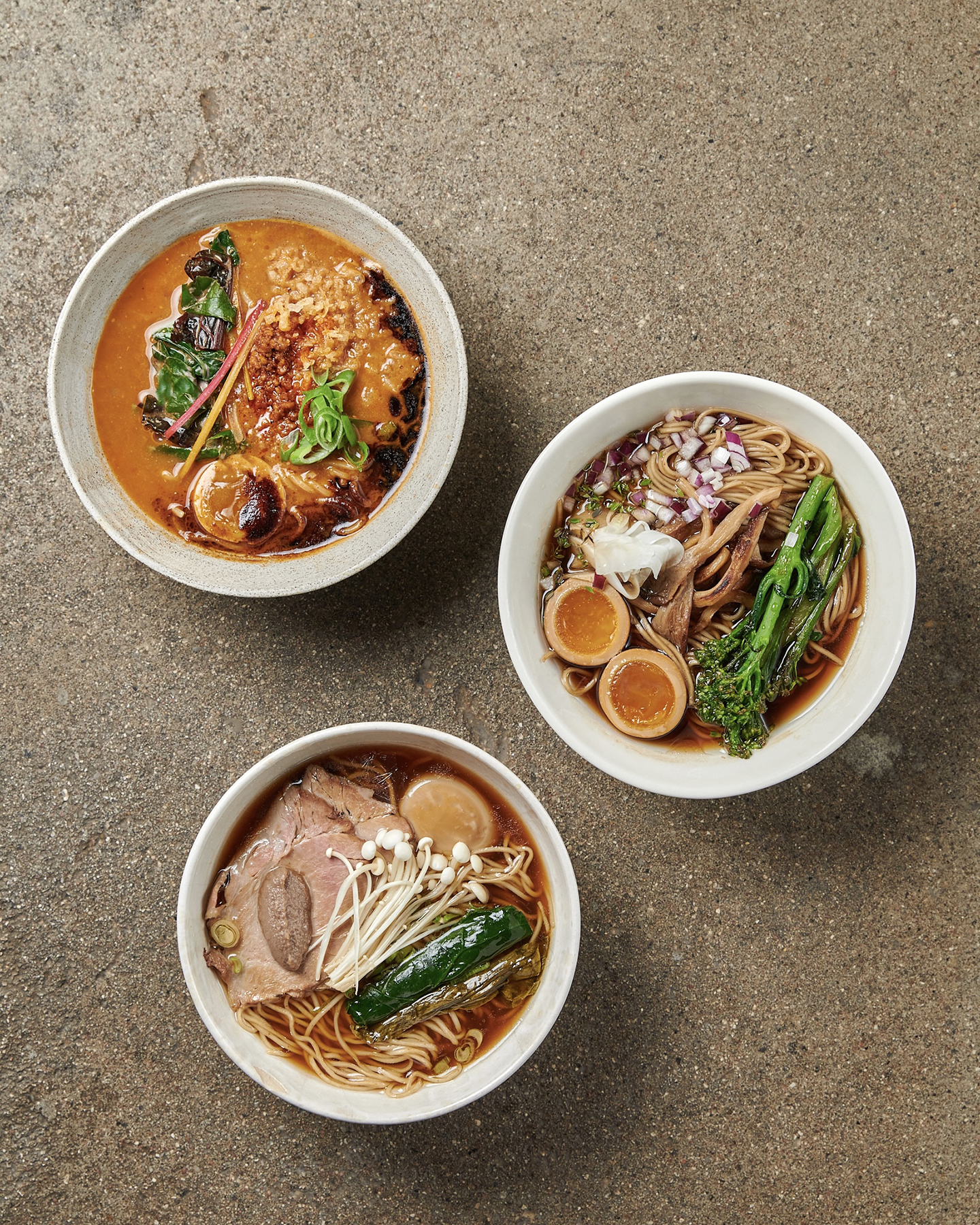 Three bowls of food on a Copenhagen restaurant table.