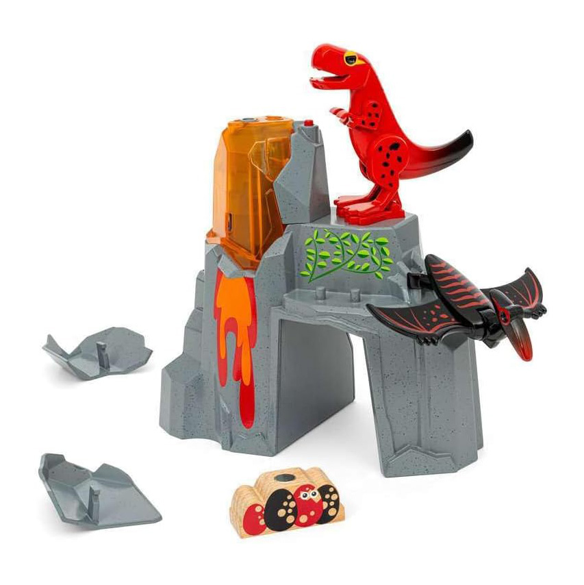 A toy set with a plastic volcano, a red dinosaur on top, and a black pterodactyl nearby, with a few additional pieces.