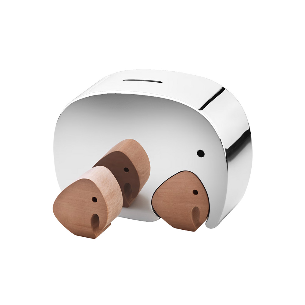 A shiny, metal elephant-shaped piggy bank with two wooden elephants inside.