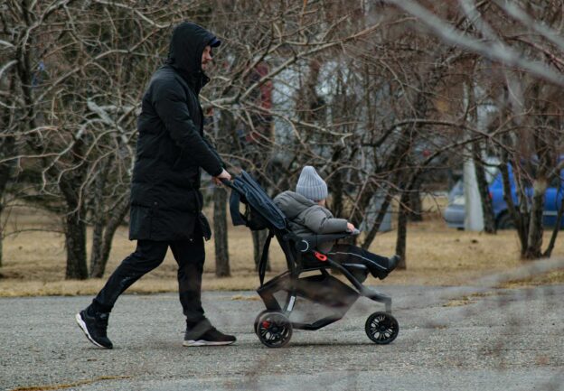There is a particular kind of pride that Scandinavian men carry when they push a stroller alone on a Tuesday afternoon, and it has nothing to do with performing fatherhood for an audience